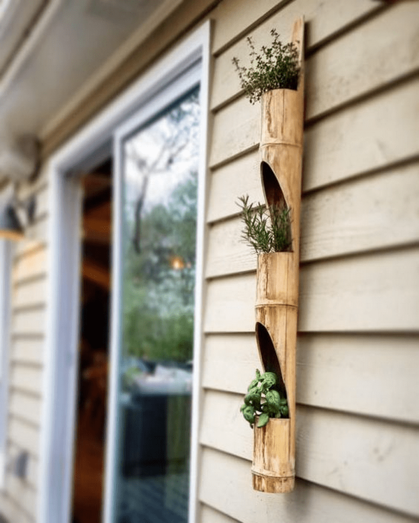 The raw and rustic look of this vertical bamboo planter adds a lot of charm.