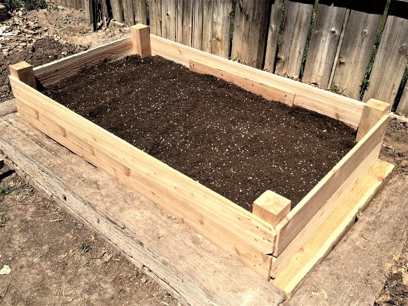 You need more substance than what potting soil can provide for a productive raised bed garden.