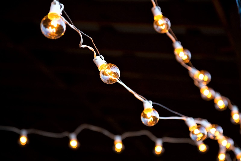 If your outdoor space already has flush mounts on a porch or wall mounts for a patio, add string lights.