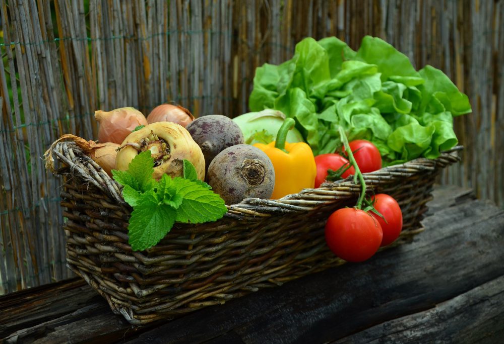Boost your health with gardening! Here's a basket of fruits and veggies.
