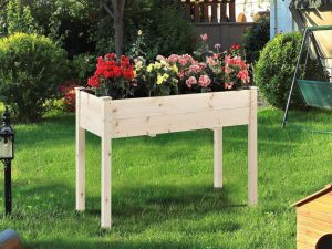 An image of a wooden garden bed for an article about waist high garden beds.