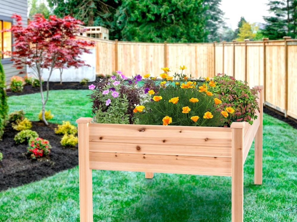 An image of a raised garden bed filled with flowers. 